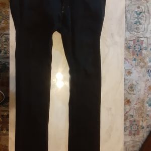 A pair of black Number Nine jeans